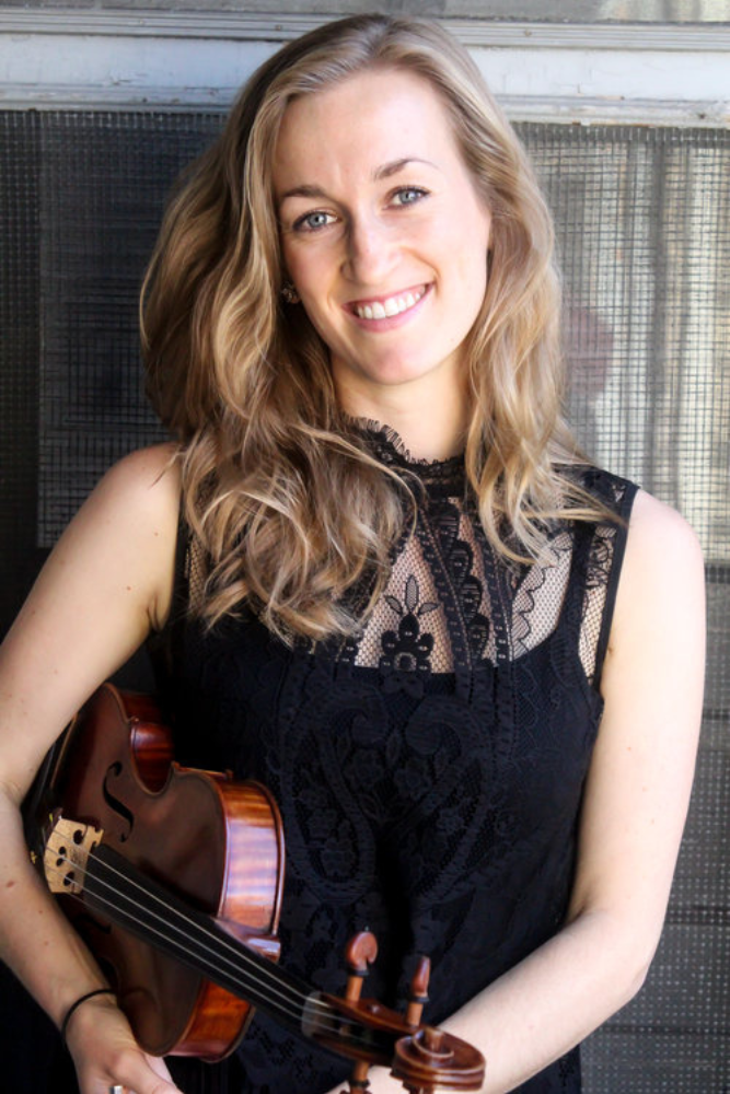 Susannah Foster with a violin